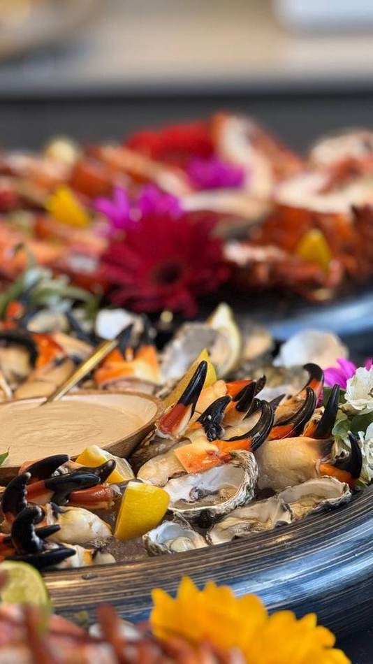 Seafood platter with orchids. Chef Tasos Luxury Dining, Miami