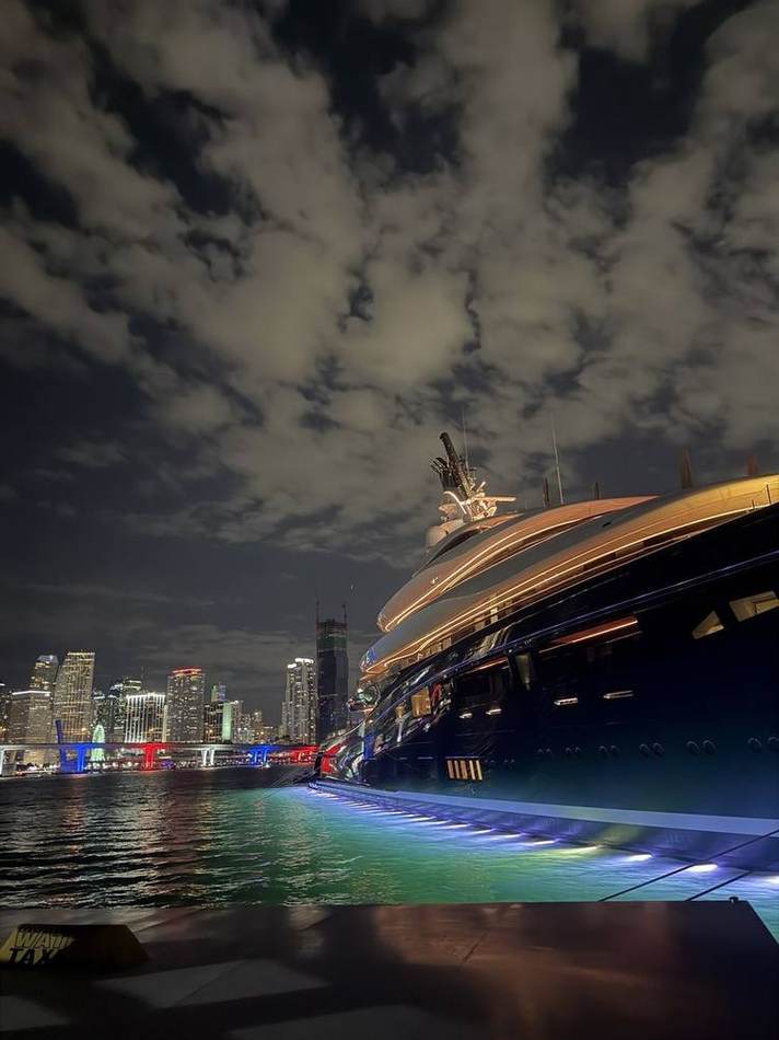 Yacht at night, Miami skyline. Chef Tasos Luxury Dining, Miami