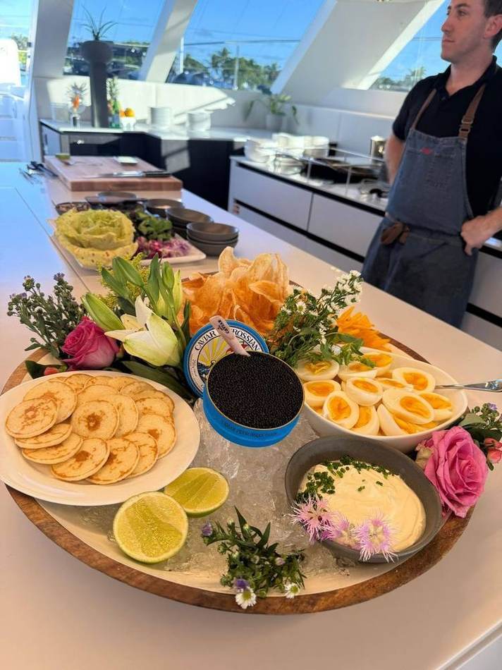 Chef with the boards. Chef Tasos Luxury Dining, Miami