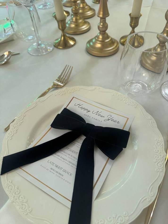 New Year place setting, black bow. Chef Tasos Luxury Dining, Miami